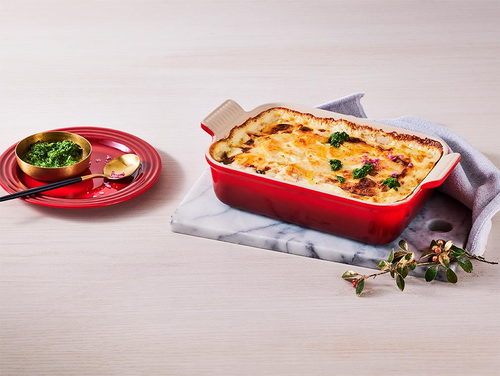 Pieczone ziemniaki w kremowo-serowym sosie